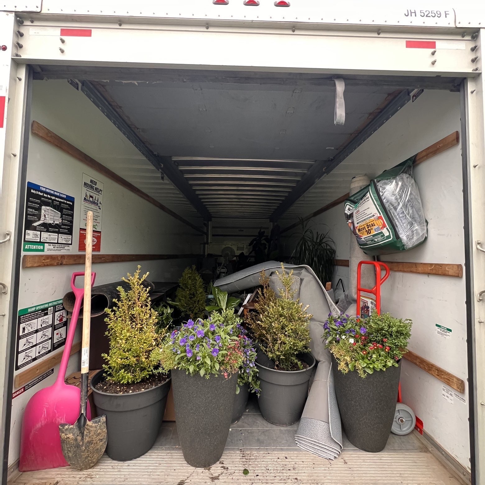 Plants and garden items loaded for transport