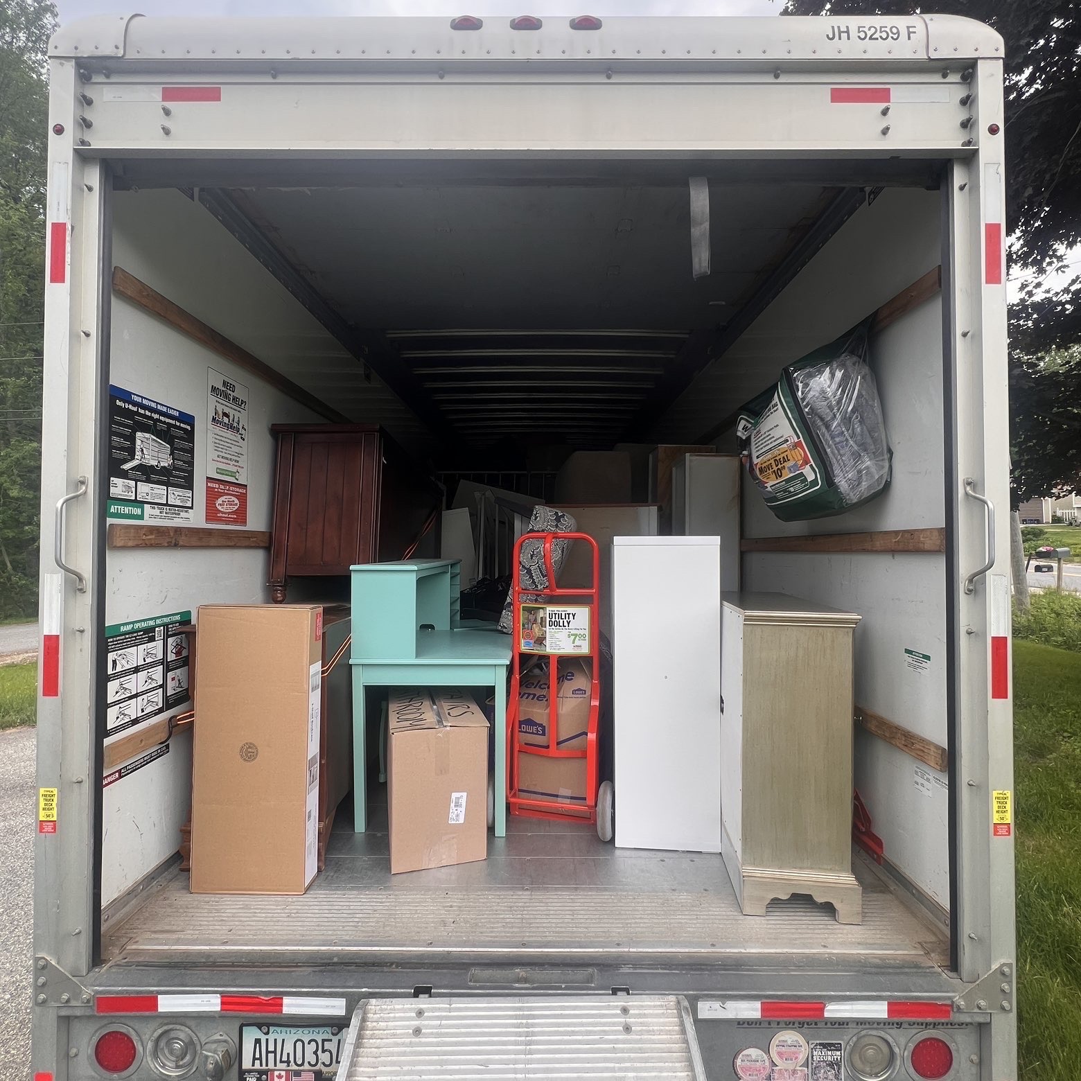 Truck packed with furniture and boxes